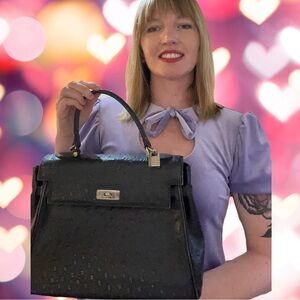 Russell Bromley - textured ostrich black purse